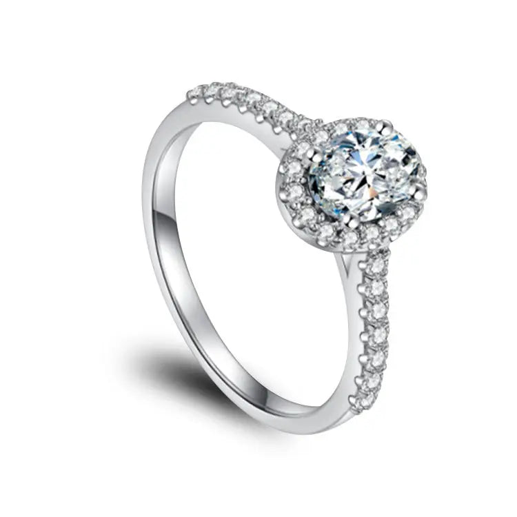 Sterling Silver Ring With Oval Cut Halo Moissanite