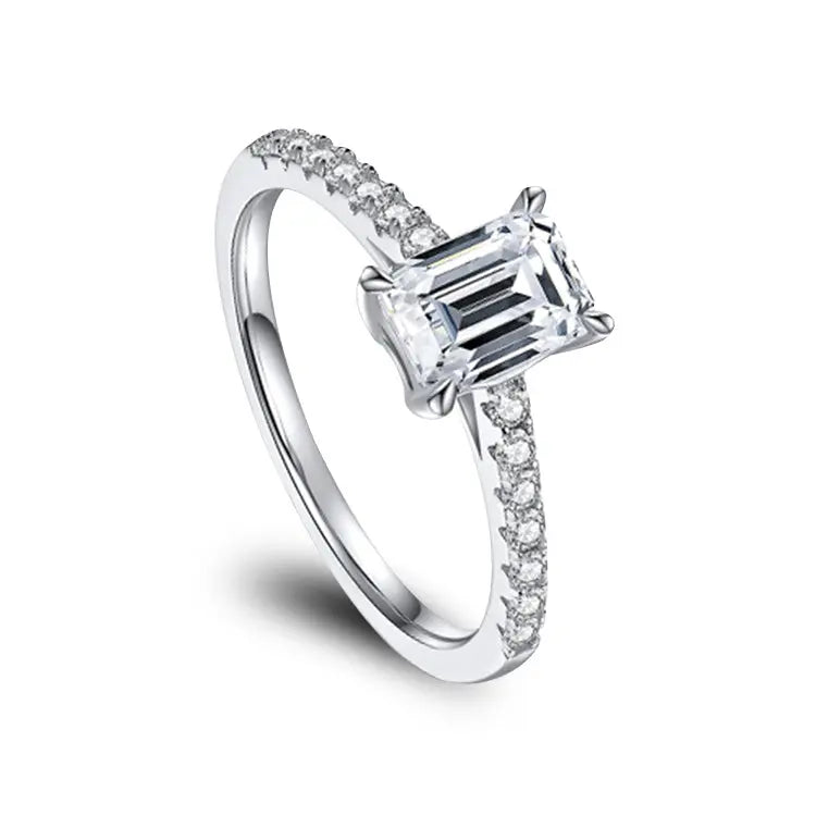 Sterling Silver Ring With Emerald Cut Moissanite and Zirconia stones on band