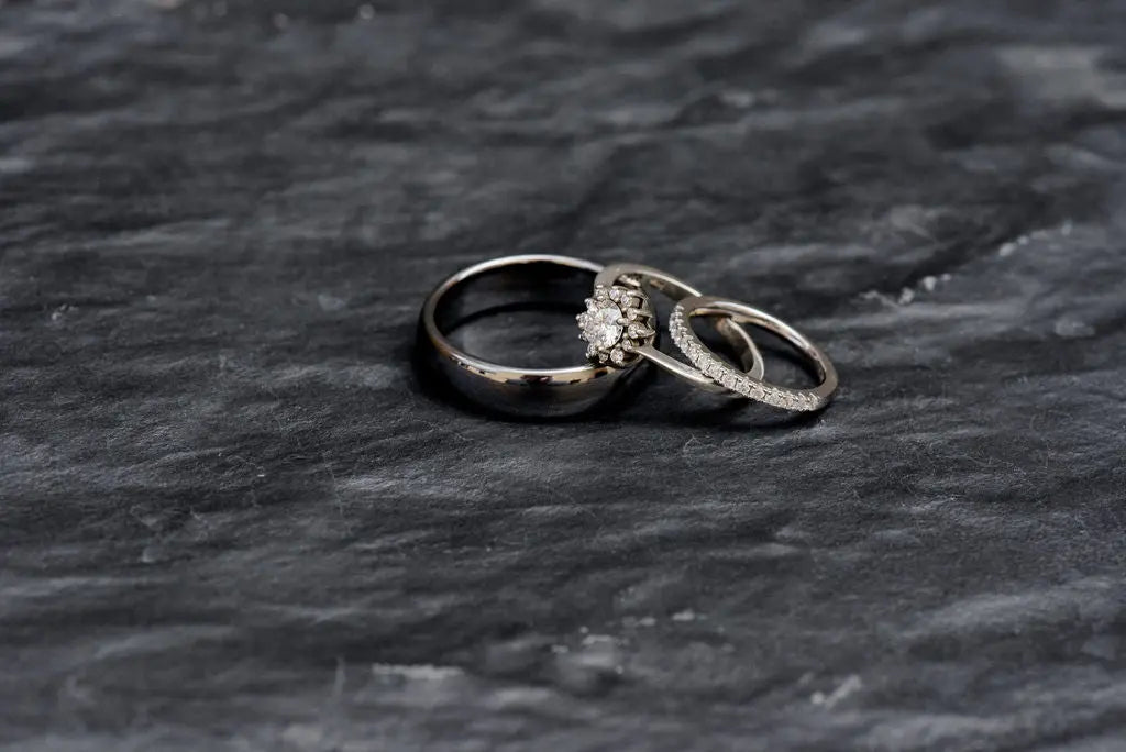 Three Silver Sterling Rings On Charcoal Backdrop