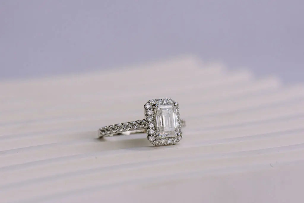 Emerald cut moissanite ring with sterling silver band