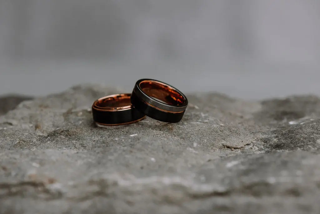 Two Rose Gold Tungsten Carbide Rings With Brushed Black Outers