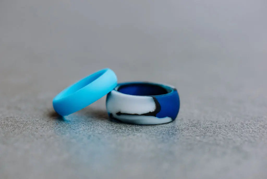 Two blue Silicone Rings on Grey Backdrop
