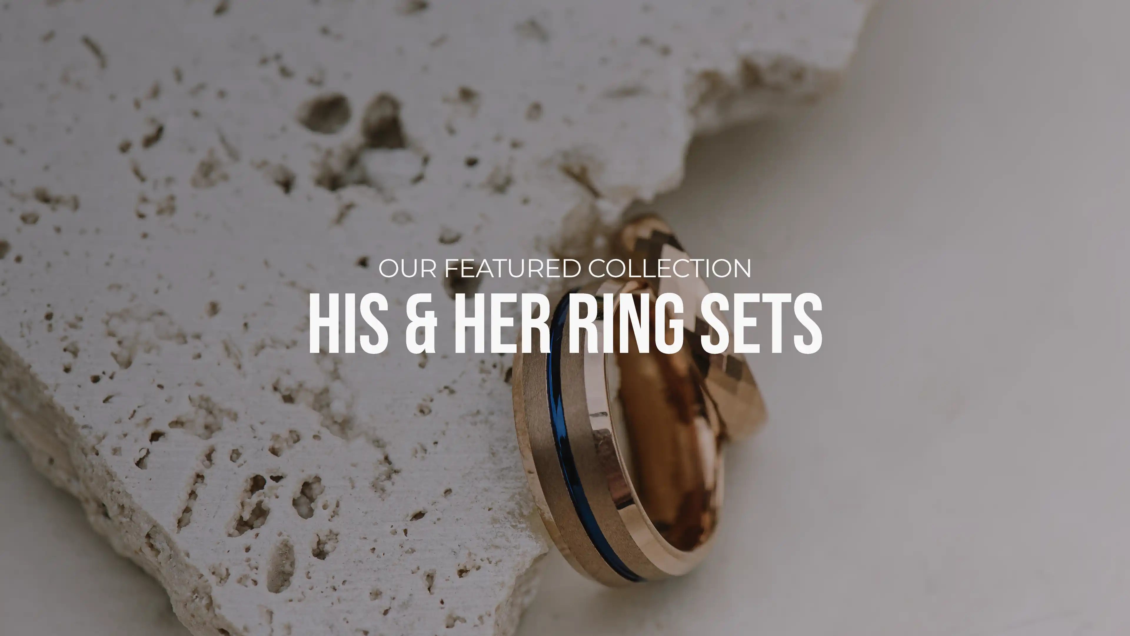 A set of gold his and hers tungsten carbide rings