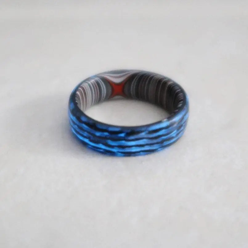 Orbit Rings mens ring and engagement ring with fordite and carbon fibre